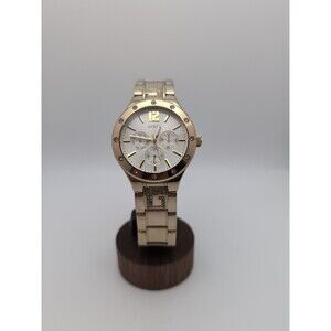 GUESS Women's U15078L1 Quartz Analog Chrono Dress Watch. Good Tone w Crystal "G"